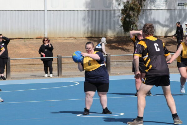 GIVING IT THEIR ALL ON THE DAY...Sophie Woolman from the Echuca Rockettes, competes at the Mooroopna Access all Abilities Football Netball Carnival.