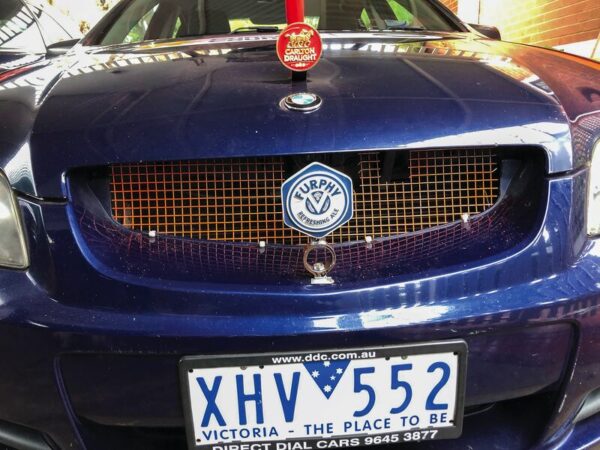 ADVENTURE... Team A-Drive and Kicking's 2007 V8 Commodore emblazoned with Furphy and Carlton Draught merchandise. Photo: Supplied