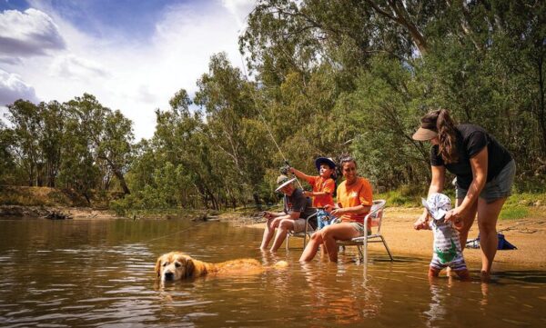 GATHER THE GANG... With people keen to get back outdoors, Steve Threlfall, owner of Trelly's Outdoors and pictured far left with his family on the banks of the Goulburn River, has seen locals investing in theirs and their family's comfort. Trelly's Outdoors has heaps of stock to help you get the best from your next trip. Photos: Ross Threlfall