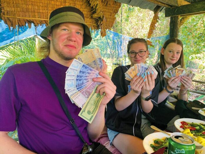 STUDENTS ABROAD... History students at Shepparton ACE Secondary College have been treated to an extraordinary tour of Cambodia and Vietnam, which was sponsored by the school. Pictured from left, Leo McNally, Immegin Langley and Sharni Wilson. Photo: Supplied