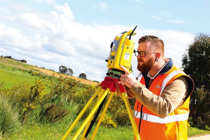 MEETING DEMAND... The Chris Smith & Associates team comprises of urban planners, licensed surveyors and civil engineers working together to achieve their clients desired outcomes on a wide variety of projects. Pictured is irrigation designer/surveyor, Nathan Jarrett. Photo: Kelly Carmody