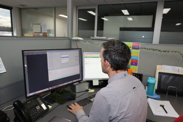 WANTED: GRAPHIC DESIGNER... The Adviser is looking for a qualified and enthusiastic graphic designer to join our team. Pictured is talented graphic designer Matthieu Ryan working away at his desk. Photo: Stephanie Holliday